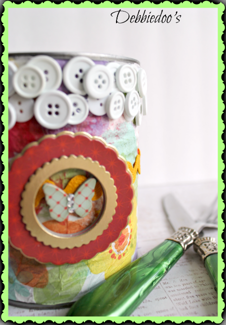 mod podge on a can and embellish with buttons