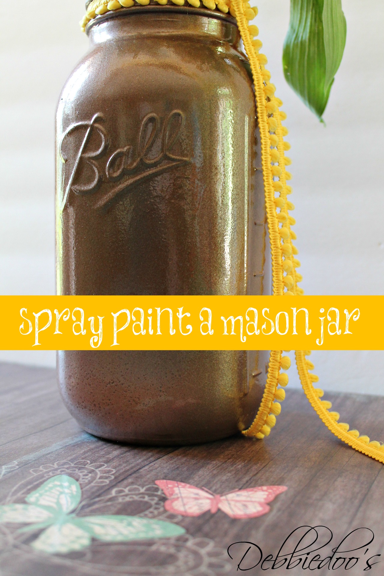 mason jar spray painted with rust-oleum  spray paint