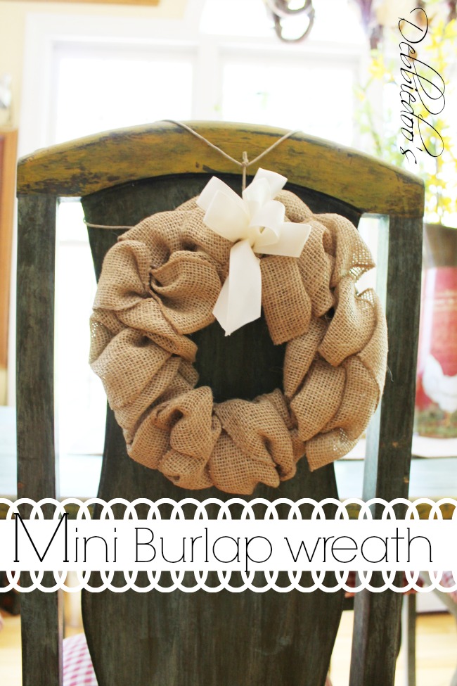 burlap chair wreath, pillow and runner in the kitchen