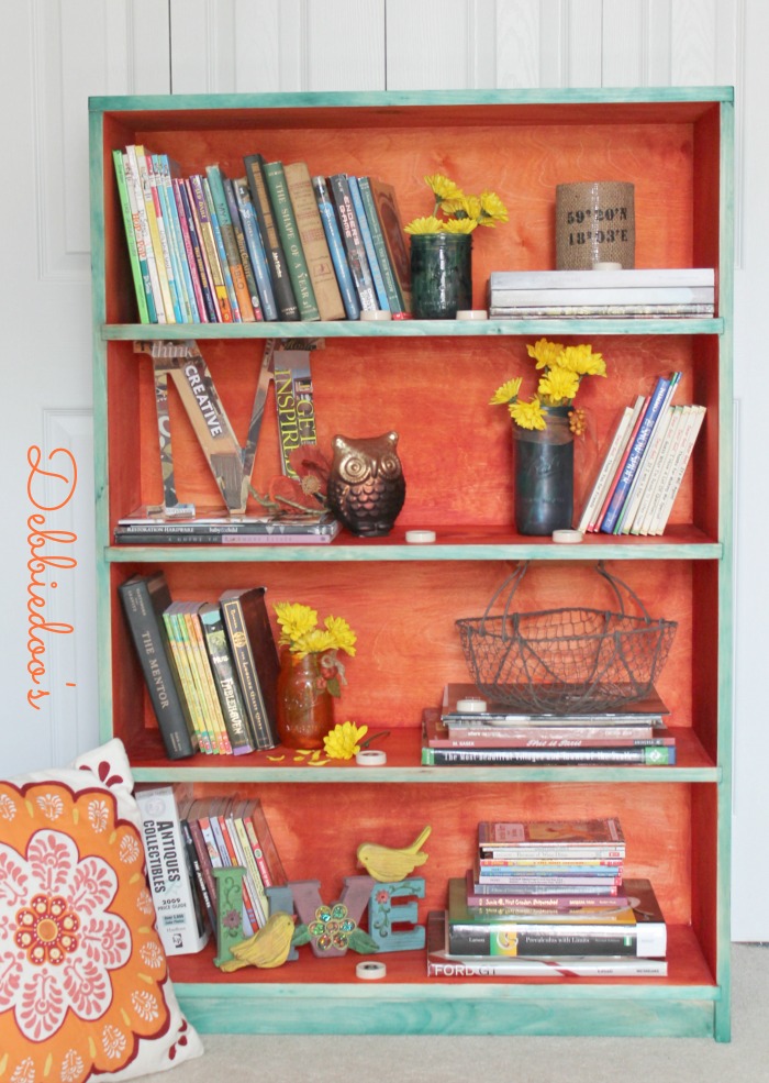 Funky fun book shelf painted with rit dye teal and tangerine
