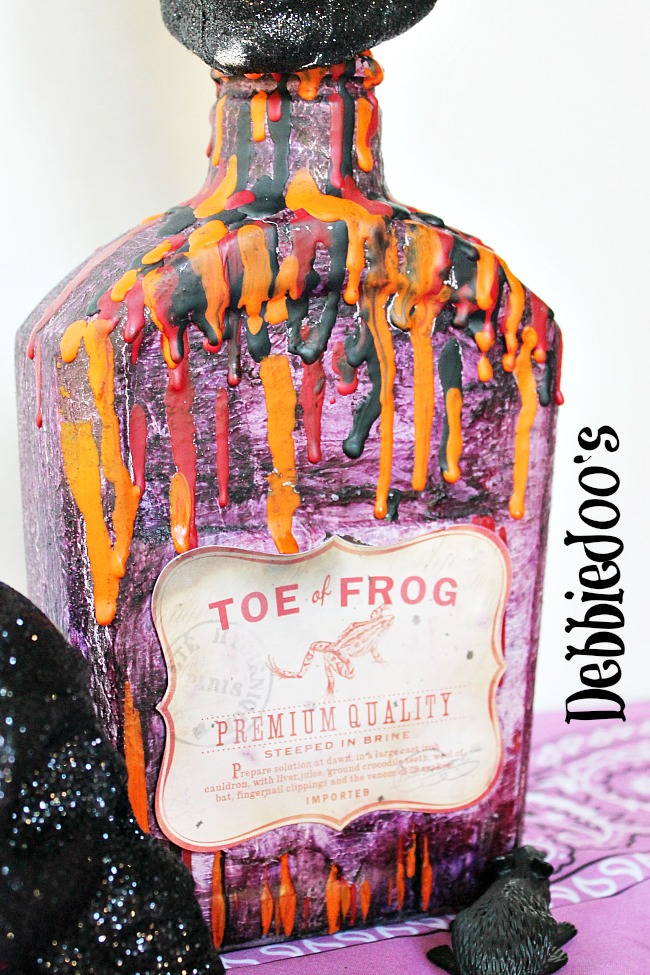 Make a spooky Halloween bottle recycled craft