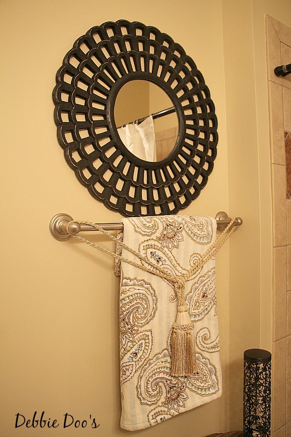 Bathroom mirror and towels from Home goods