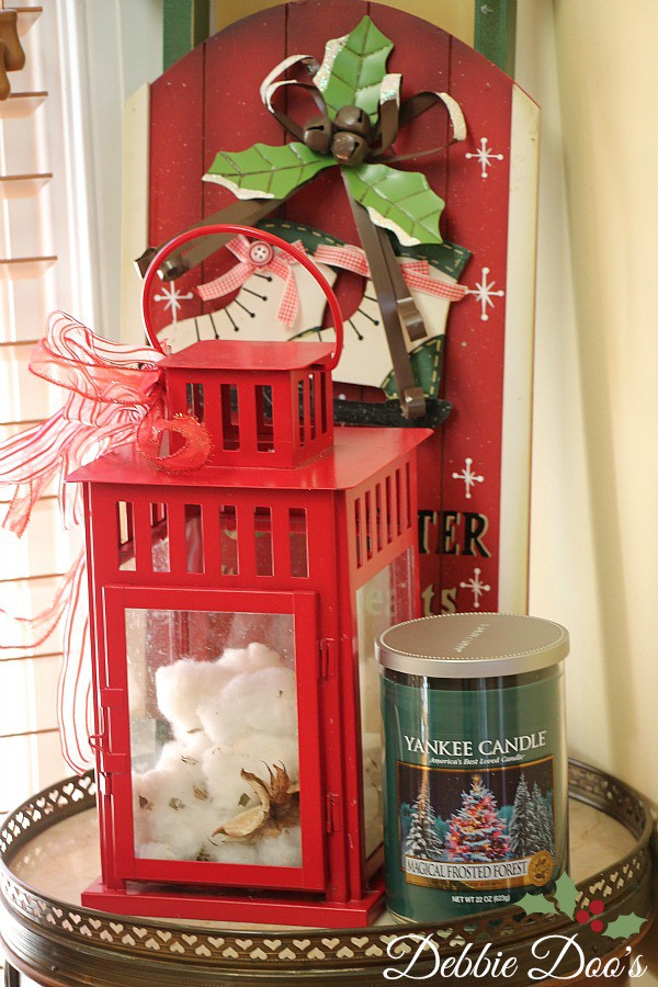 Holiday vignettes with yankee and lantern