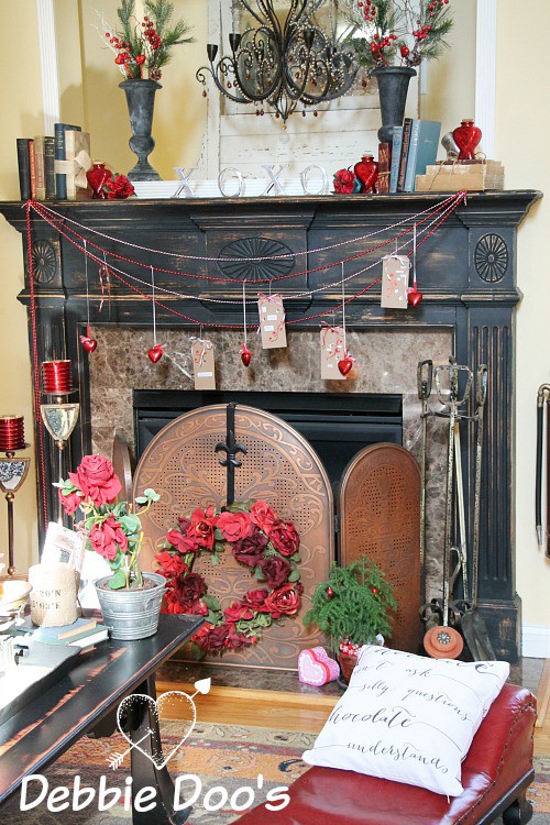 Valentine mantel with diy banner and vintage flair