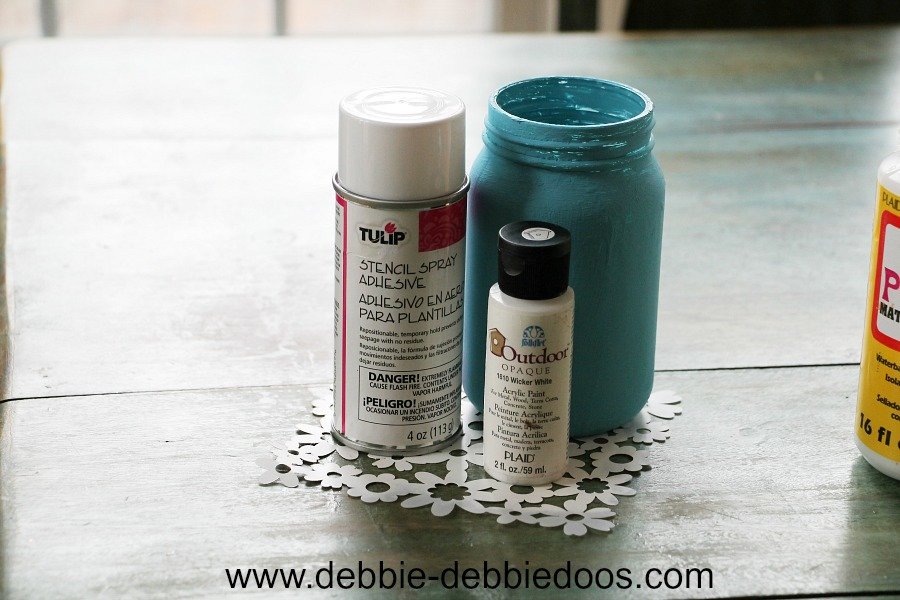 Stencile adhesive and stencil used on a mason jar craft