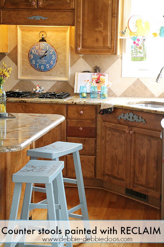 Counter stools painted with RECLAIM paint and stenciled with a french design