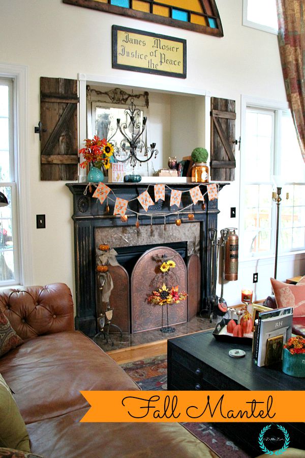 fall mantel decor with owls and sunflowers