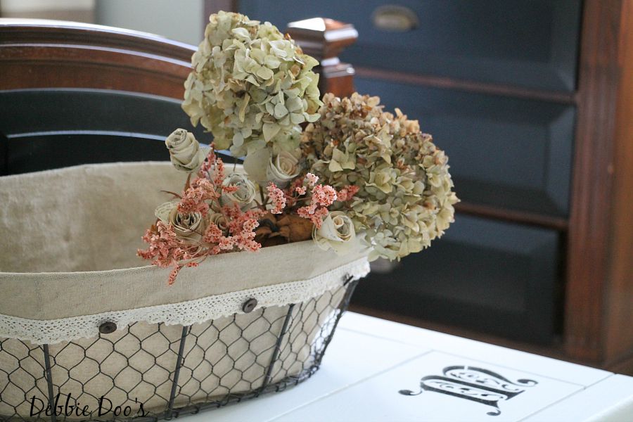 dried hydrangeas in a burlap basket