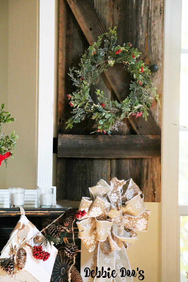 Rustic wood shutters that anchor the fireplace surround