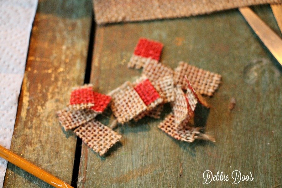 cut up pieces of burlap for glass ornaments