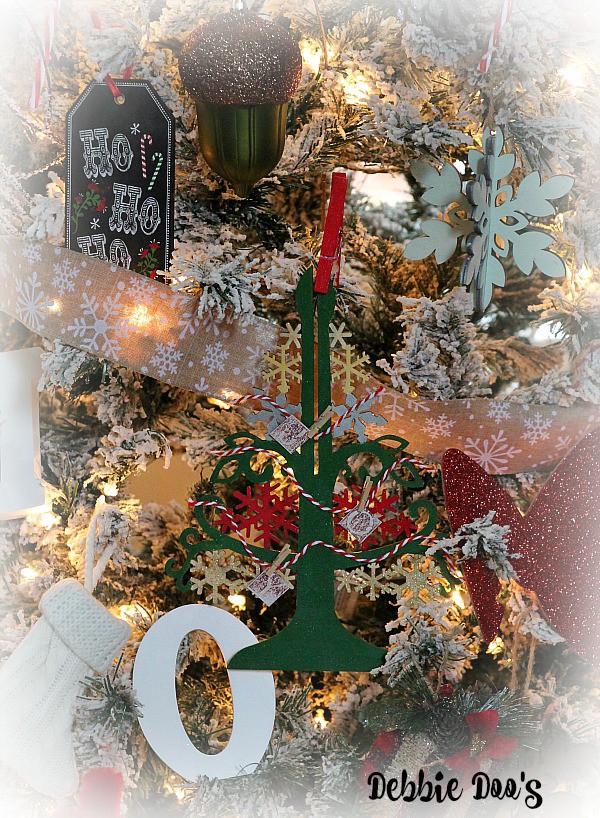 diy Christmas wood ornament using craft paint and mod podge