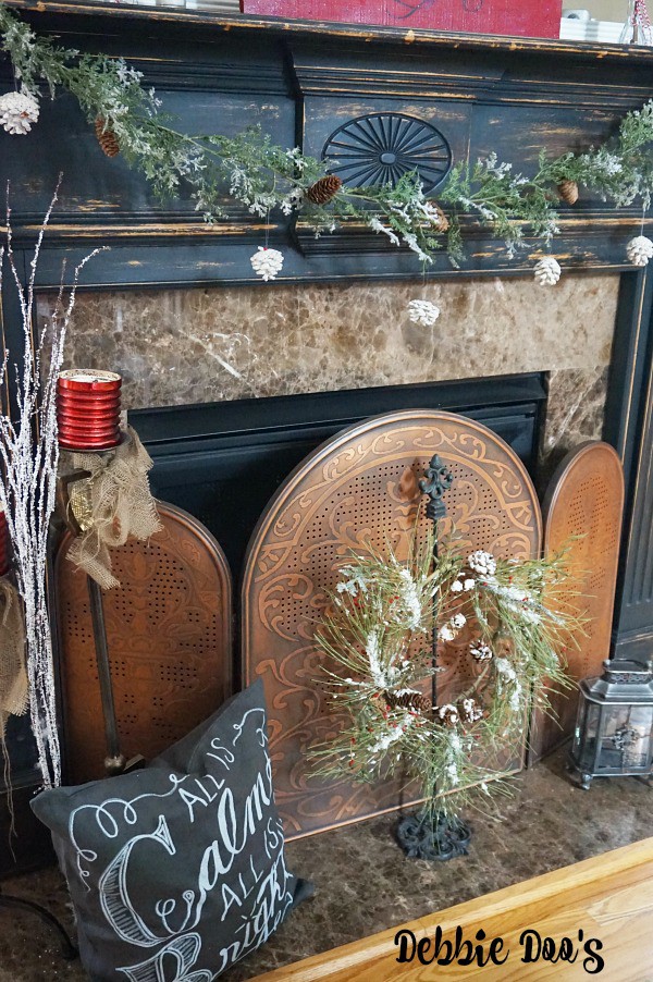Transitioning from a Christmas mantel to a Winter mantel