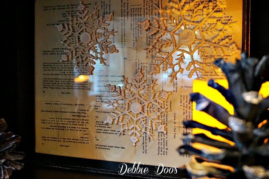 Winter frame snowflake craft idea with old book pages and mod podge