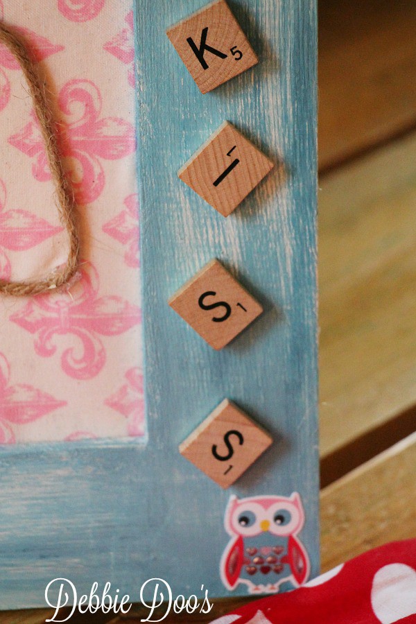 Scrabble letters on picture frame