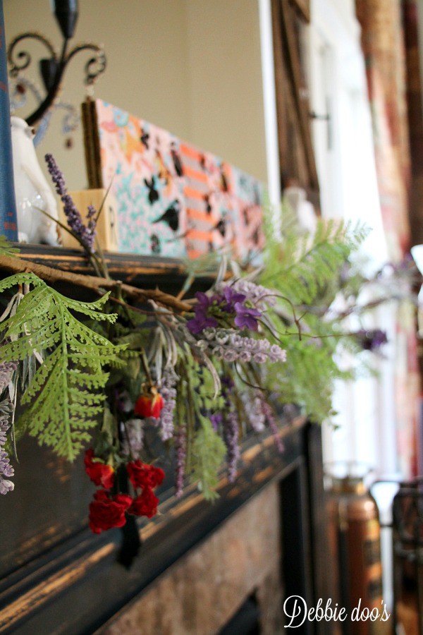 Spring mantel decor with birds and wild flowers