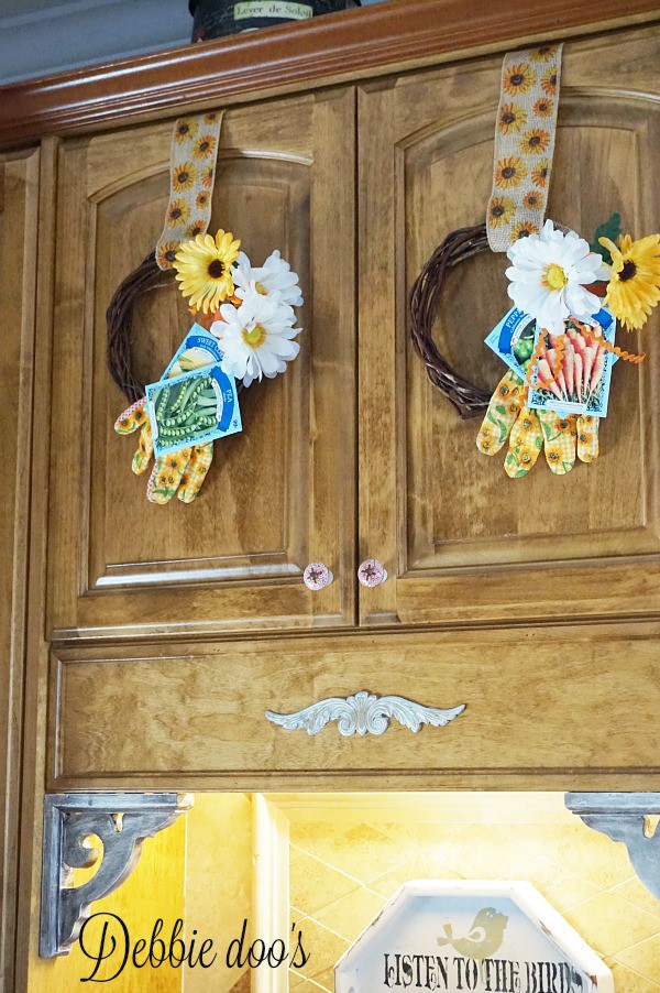 Spring wreaths on the cabinets