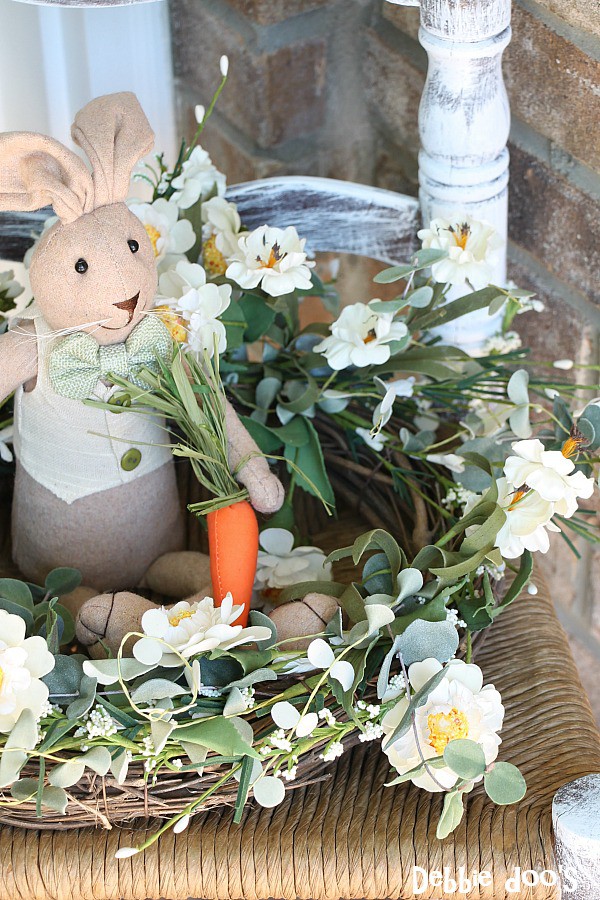 Spring wreath and bunny on a thrifty chair for the porch