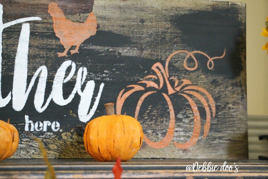 rustic-fall-mantel-sign-with-pumpkin-and-gather-here-stencil-by-debbiedoos