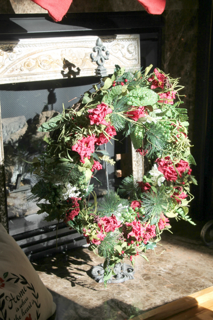 christmas-wreath-in-front-of-the-fireplace
