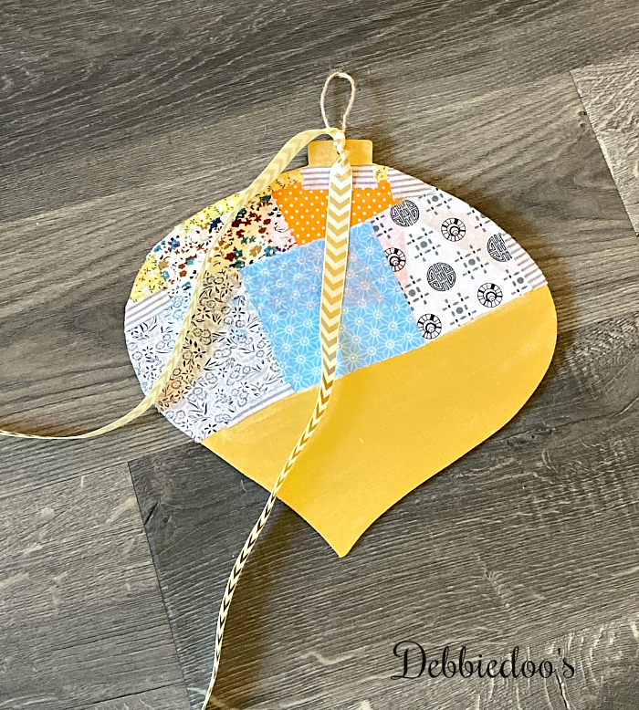 Dollar Tree Christmas wood cutout makeover with paint, mod podge and fabric