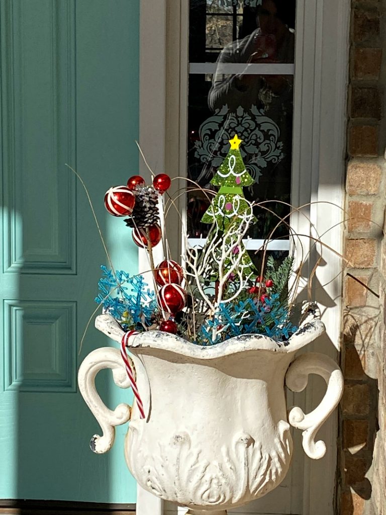 Christmas urns filled with ornaments, and Dollar tree decorations