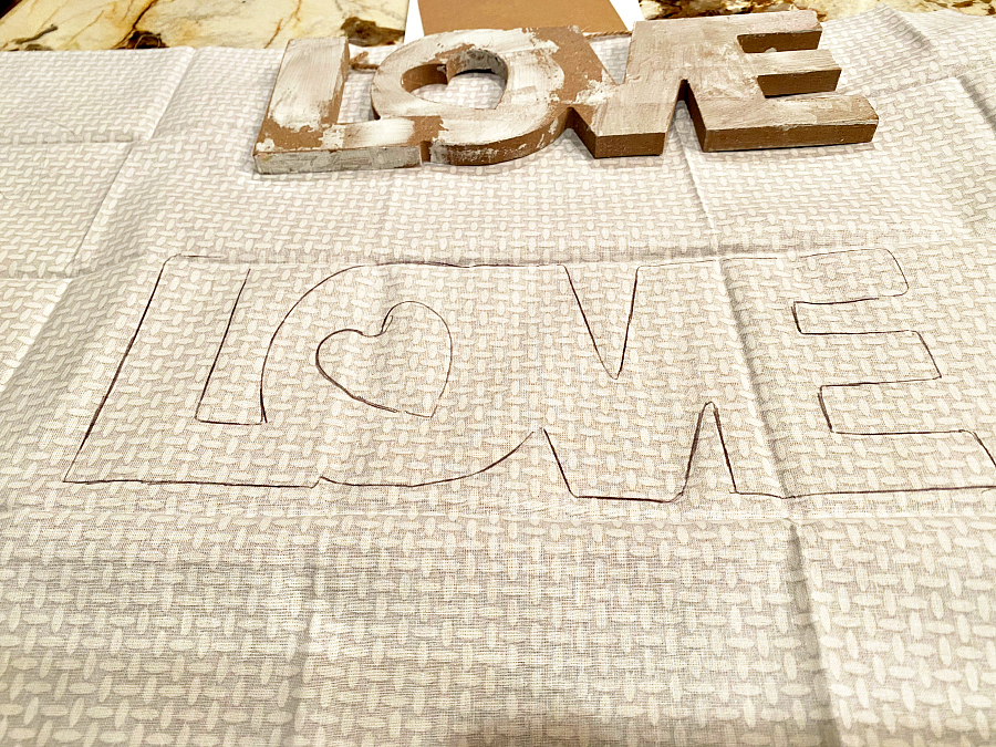 Mod podge on wood love sign from dollar tree