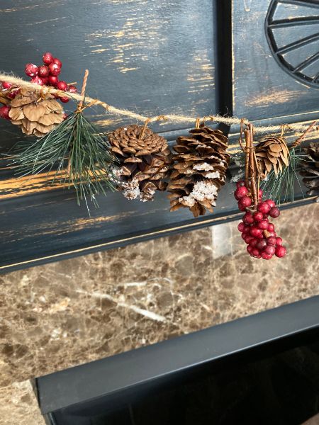 Wintery pine cone garland for the mantel