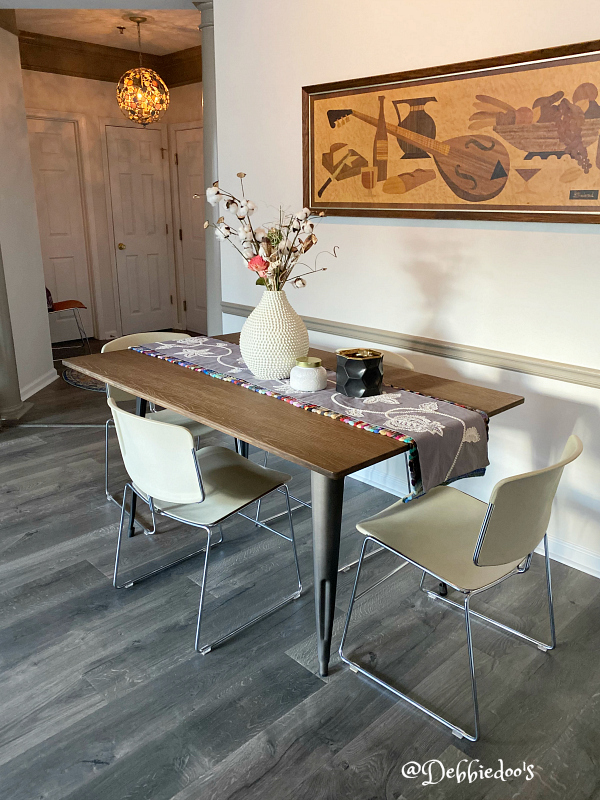 Small condo dining room with vintage chairs